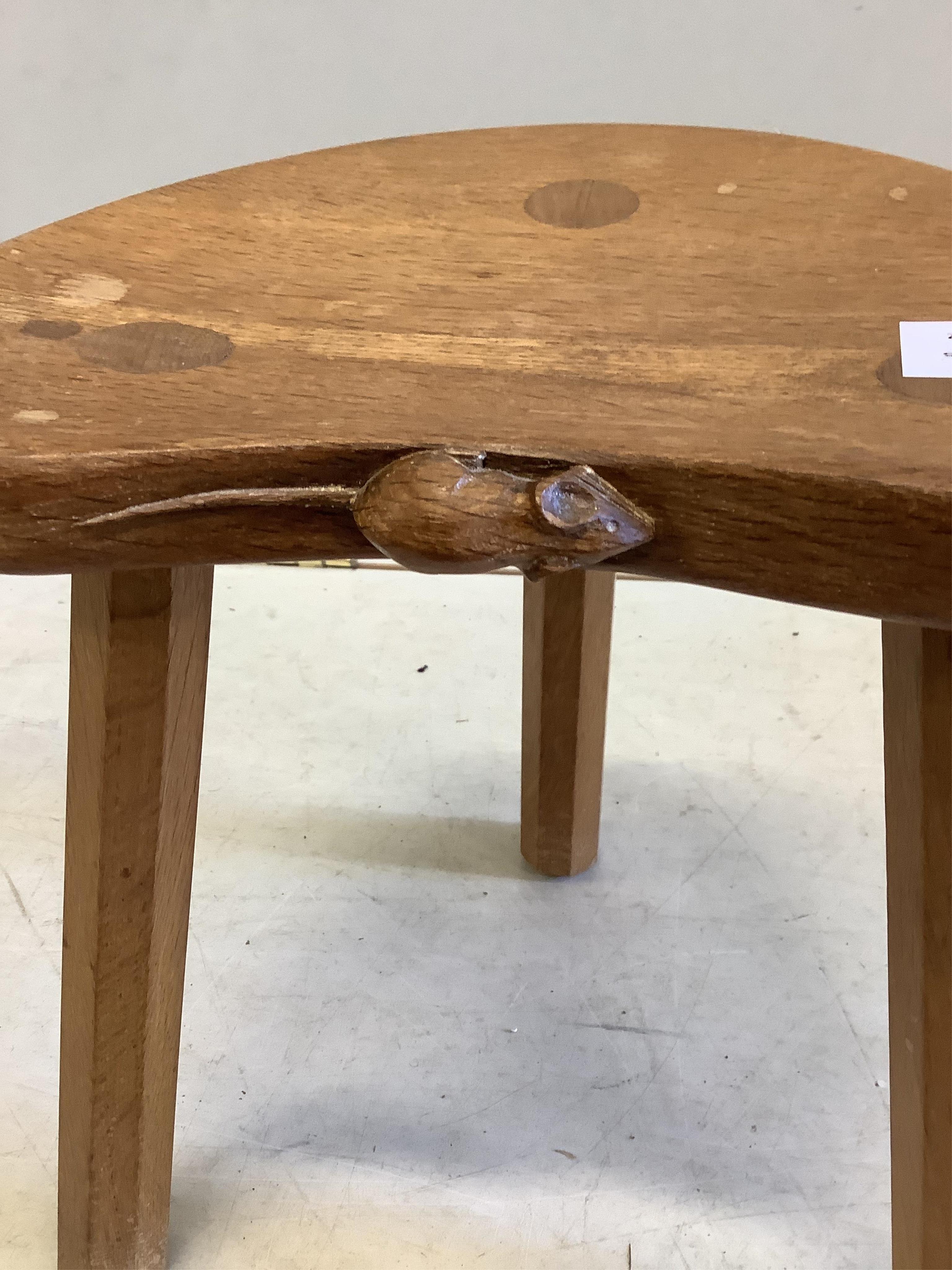 Robert Thompson (the Mouseman) an oak stool, width 30cm, depth 24cm, height 35cm